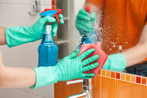 Kitchen deep cleaning with focus on appliances, counters, and cabinets