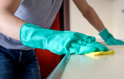 Cleaning crew providing janitorial services in a business facility
